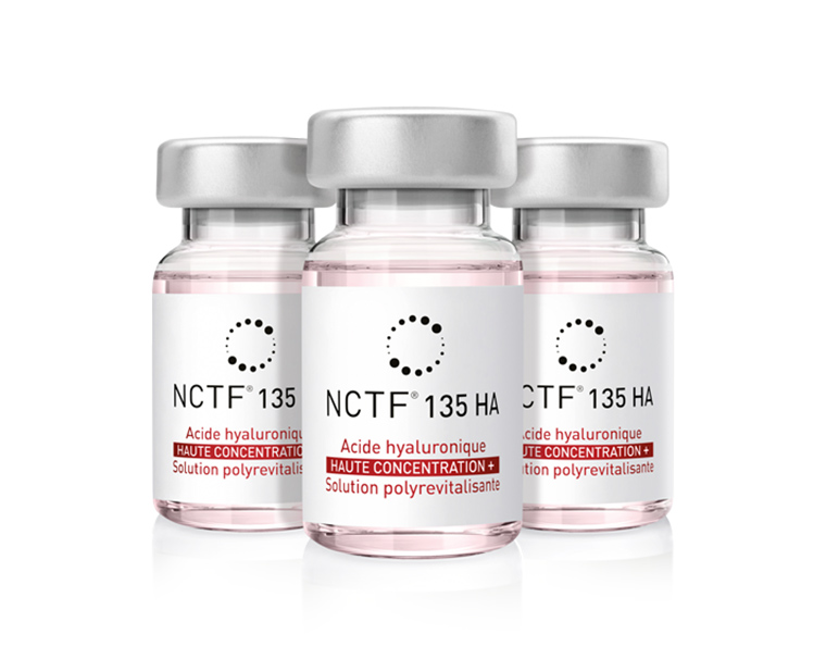 showing 3 bottle vial nctf in pink solution